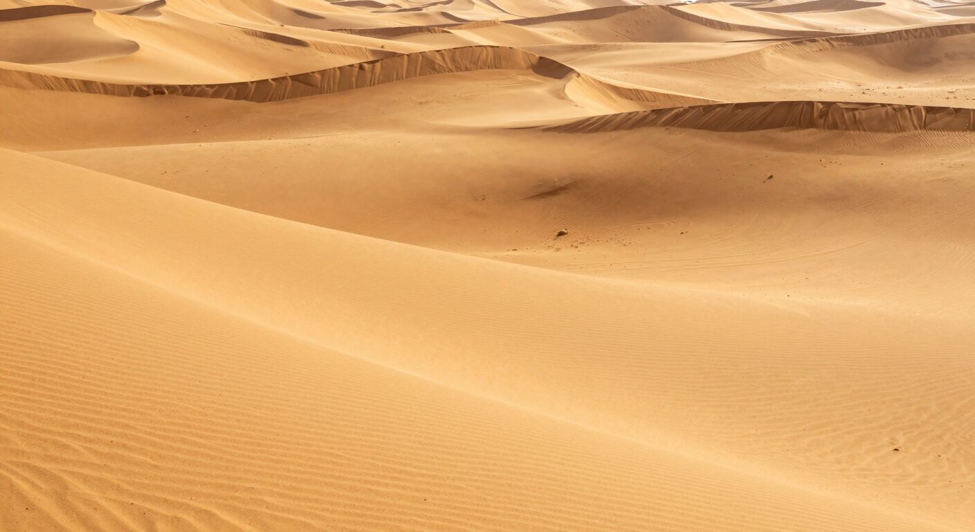 Golden desert sand dunes landscape